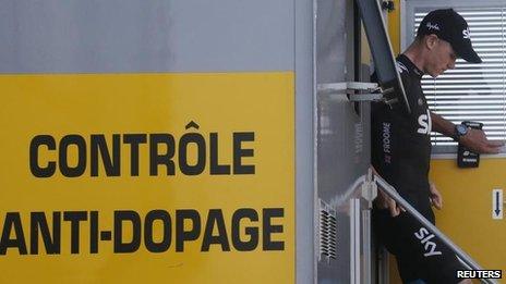 Chris Froome leaves the doping control van on the 2013 Tour