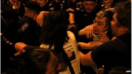 Police detain protestors in central Moscow late on July 18, 2013