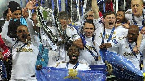 Swansea players celebrate their Capital One Cup victory