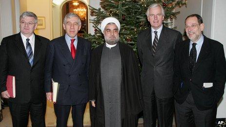 Jack Straw (2nd left) and Hassan Rouhani (centre) in December 2004