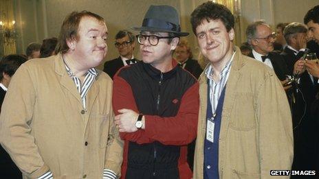 Mel Smith with Elton John and Griff Rhys Jones