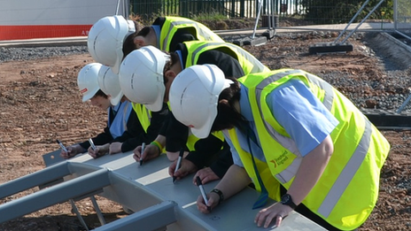 Schoolchildren signed steel frame