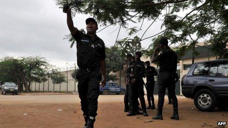 Policemen outside the prison
