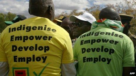 Robert Mugabe greets supporters (July 2013)