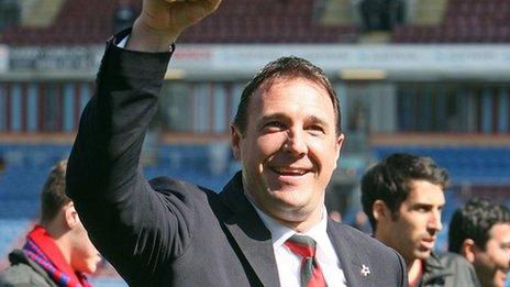 Malky Mackay waves to the Cardiff City fans