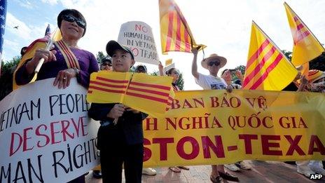 Several hundred demonstrators from the Vietnamese-American community rally outside the White House on 25 July 2013 in Washington, DC