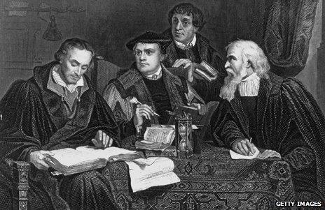 A black and white depiction of Martin Luther and three other German reformists of the Catholic Church