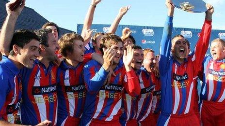 Jersey celebrate with the trophy