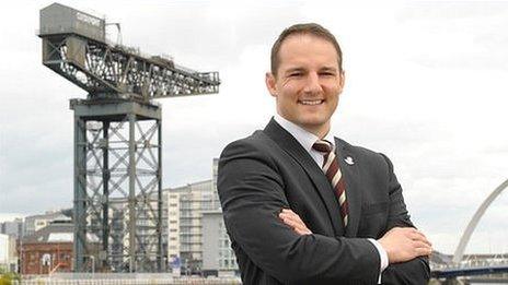 David Grevemberg at Glasgow's River Clyde with the Finnieston Crane in the background