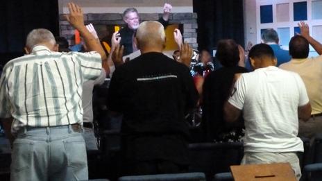 A church service at the nearby church