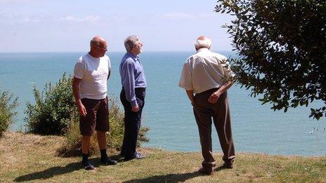 Members of the Fairlight Preservation Trust on the edge of the cliffs at Rockmead Road (left to right - Laurie Beetham, Paul Capps and Dr John Sinclair)