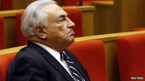 Former International Monetary Fund (IMF) chief Dominique Strauss-Kahn reacts as he attends a French Senate commission inquiry on the role of banks in tax evasion in Paris in this June 26, 2013 file picture.