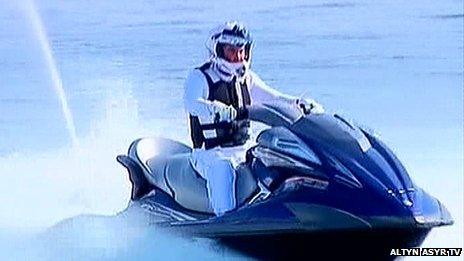 President Gurbanguly Berdimuhamedow riding a jet ski