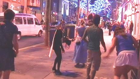 Revellers on Swansea's Wind Street