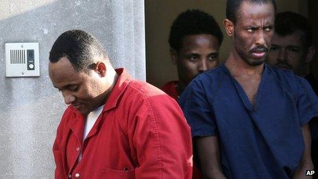 Shani Nurani Shiekh Abrar, Abukar Osman Beyle and Ahmed Muse Salad leave the federal courthouse at an earlier hearing in Norfolk, Virginia, on 4 June 2013