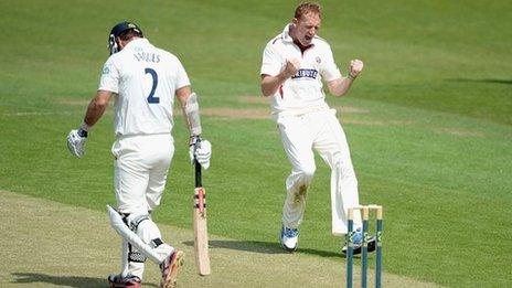 Steve Kirby celebrates taking a wicket