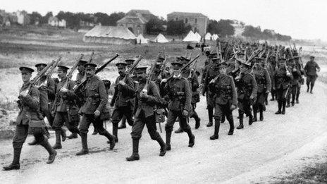 British infantrymen marching towards the front lines in the River Somme valley