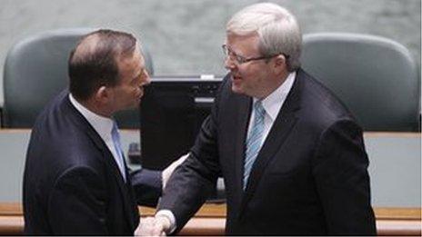 Australian PM Kevin Rudd (r) shakes hands with opposition leader Tony Abbott (l) on 27 June 2013