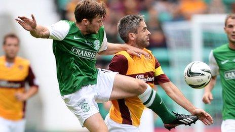 Lewis Stevenson challenges Motherwell's Keith Lasley at Easter Road