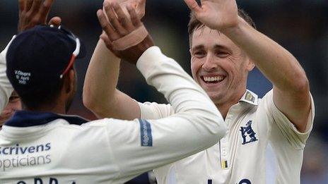 Chris Woakes celebrates with Varun Chopra