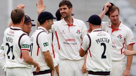 Kyle Hogg (centre) celebrates with Lancashire team-mates