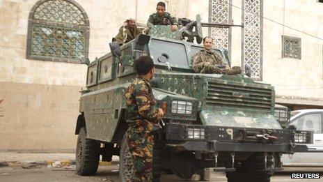 Police troopers secure a street leading to the British embassy in Sanaa on 5 August 2013