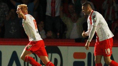 Stevenage's Jordan Burrow (left) celebrates scoring during the Capital One Cup