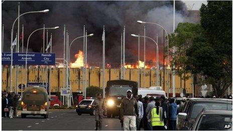 Black smoke billows from the international arrival unit of Jomo Kenyatta International Airport in Nairobi, Kenya on Wednesday morning