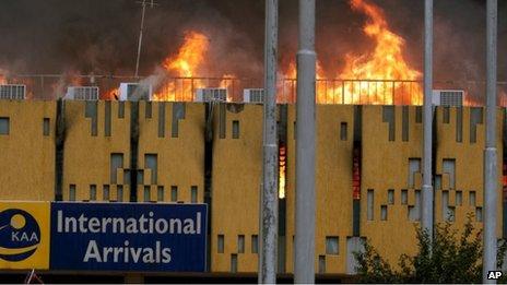 A blaze rages the arrivals hall at the Jomo Kenyatta International Airport in Nairobi, Kenya on Wednesday