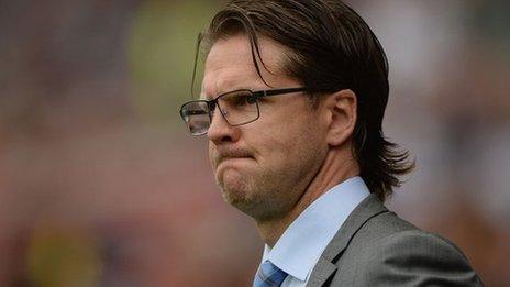 Rikard Norling frowns as he watches Swansea beat his Malmo team 4-0 at the Liberty Stadium