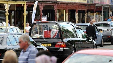 The funeral cortege for Lance Corporal Craig Roberts leaves Holy Trinity Church, Llandudno after his funeral