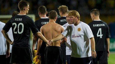 Motherwell players and their manager Stuart McCall