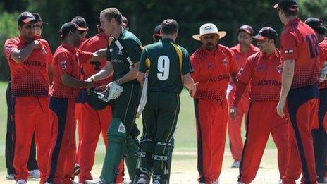 The Guernsey senior side shake hands after their game against Austria