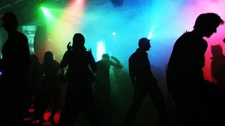 People dancing in a nightclub