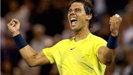 Rafael Nadal celebrates his victory over Novak Djokovic