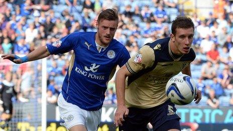 Jamie Vardy of Leicester (left) and Jason Pearce of Leeds