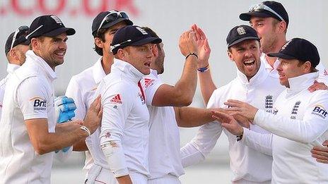 England celebrate a wicket