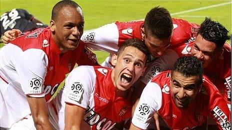 Monaco players celebrate a goal against Bordeaux in their opening Ligue 1 match of the season