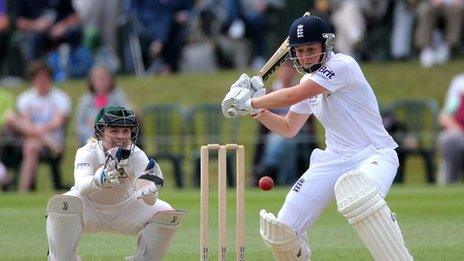 England's Heather Knight hits out watched by Australia wicketkeeper Jodie Fields