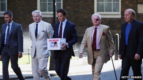 Army and religious figures arrive at Downing Street