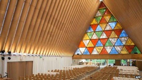 This handout picture taken on 7 August 2013 shows the interior of the Anglican Church of New Zealand made from cardboard, built in Christchurch to replace the historic Anglican cathedral destroyed in the 2011 earthquake