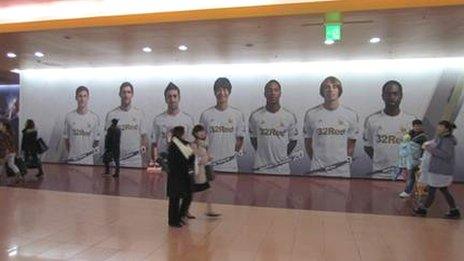 A giant poster of Swansea City players last season was displayed in a shopping centre in South Korea's capital city Seoul