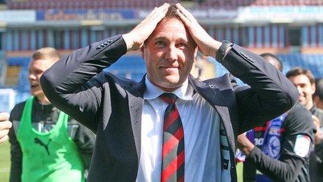 Malky Mackay celebrates Cardiff winning the Championship