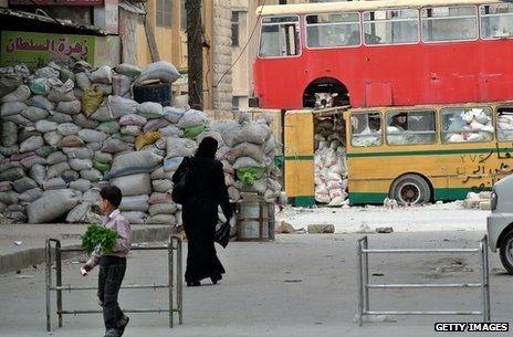 Makeshift protection against snipers in Bustan al-Kasr