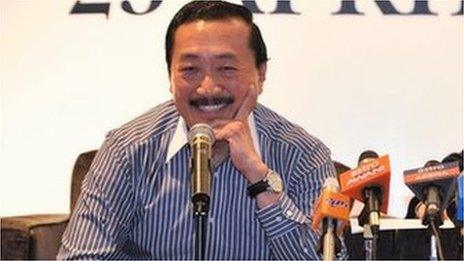 Vincent Tan speaking at a media conference
