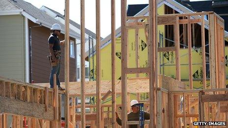 Workers and wooden beams