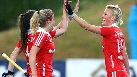 Alex Danson (R) and England team-mates