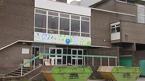 Stocksbridge Community Leisure Centre with skips outside