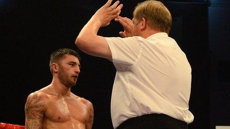 Referee Terry O'Connor stops the Nathan Cleverly v Sergey Kovalev bout