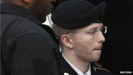 US soldier Bradley Manning is escorted into court to receive his sentence at Fort Meade in Maryland 21 August 2013